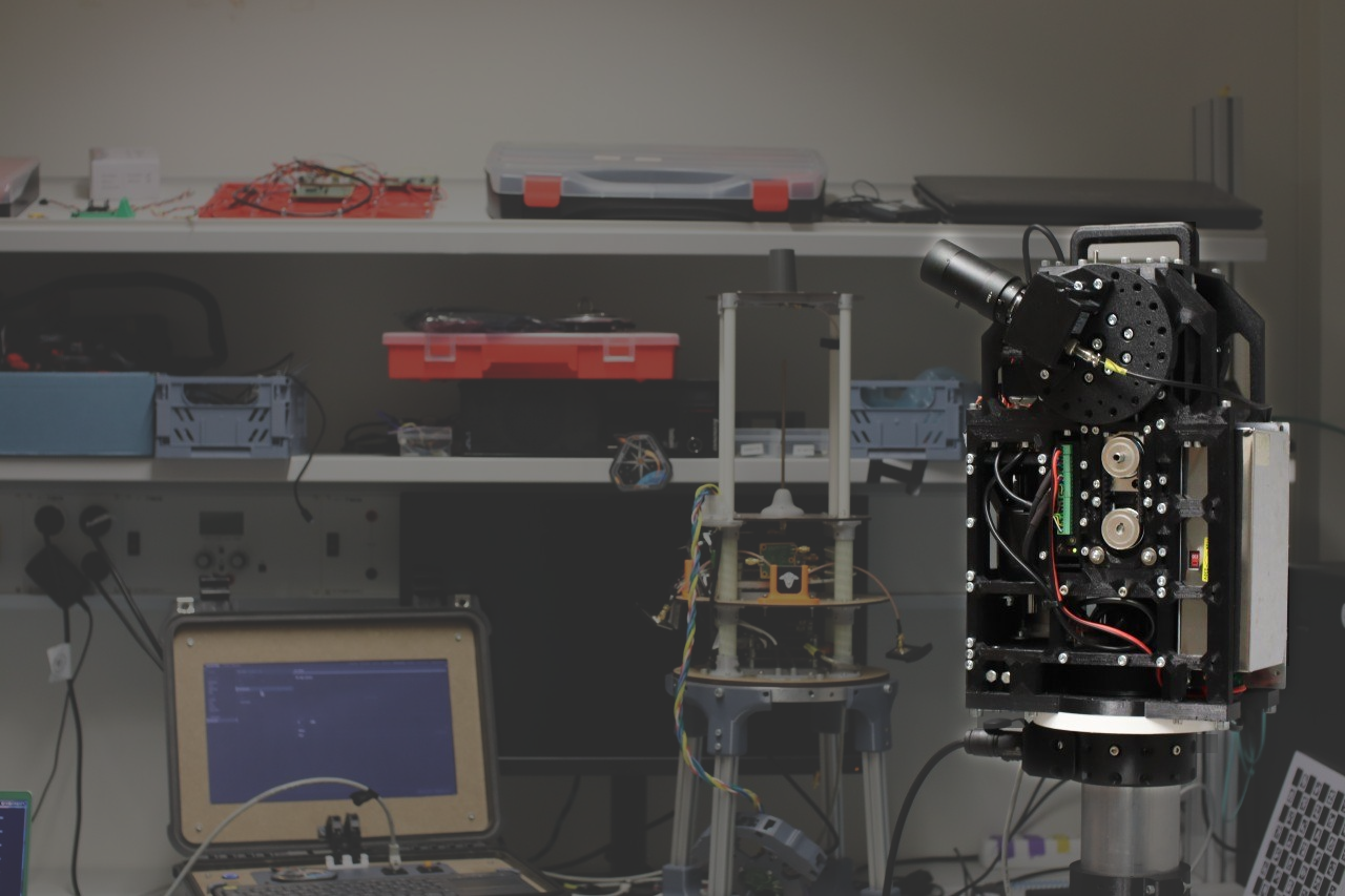 The trex antenna tracker on the right, with the avionics stack and GSE in the background